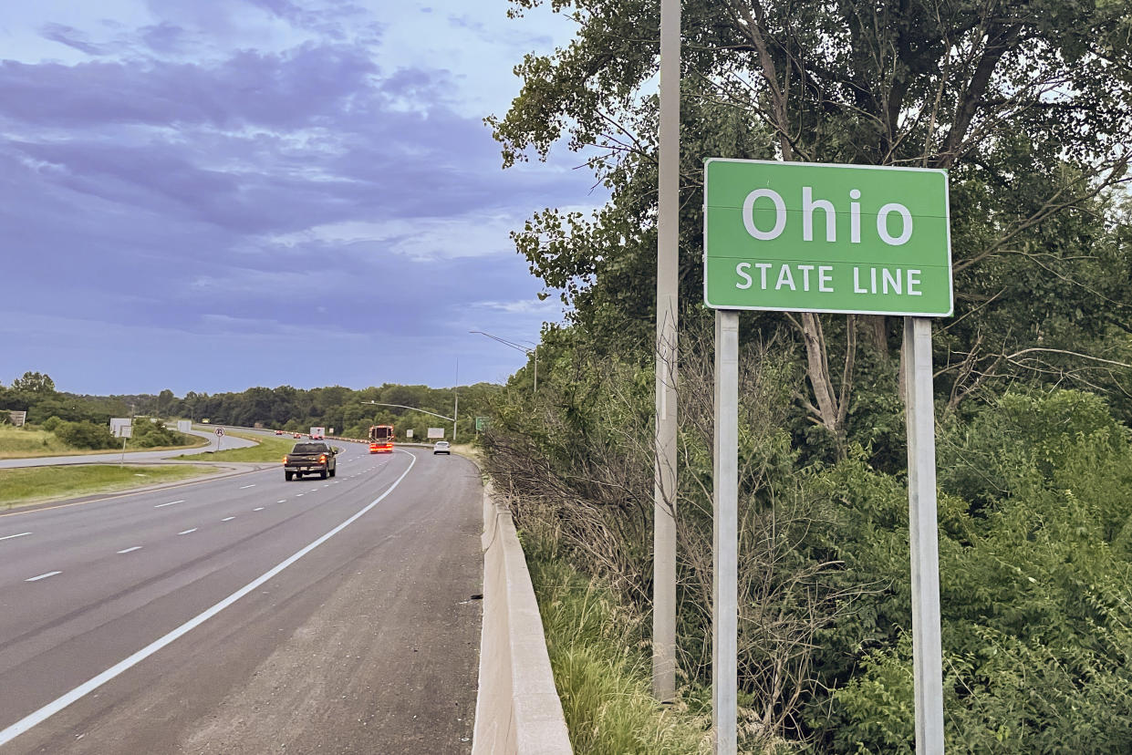 This photo from, August 3, 2022, shows an Ohio state border sign on Interstate 70 East in New Paris, Ohio. Monica Eberhart traveled this route returning to Dayton, Ohio from Indianapolis after traveling there to receive abortion care. (AP Photo/Patrick Orsagos, File)