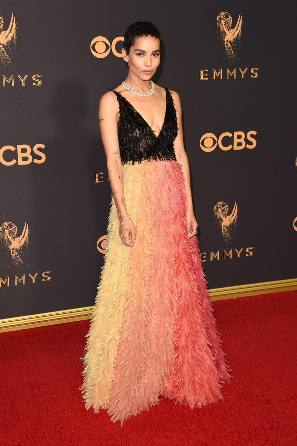 <p>Look closely and Kravitz’s ROYGBV gown is basically like a couture version of a piñata. (Photo: J. Merritt/Getty Images) </p>