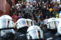 <p>Police officers in operation during a protest against the upcoming G20 summit in Hamburg, Germany, July 6, 2017. The leaders of industrialised nations, G20, are holding a two day summit starting Friday in Hamburg. (Photo: Bodo Marks/dpa via AP) </p>