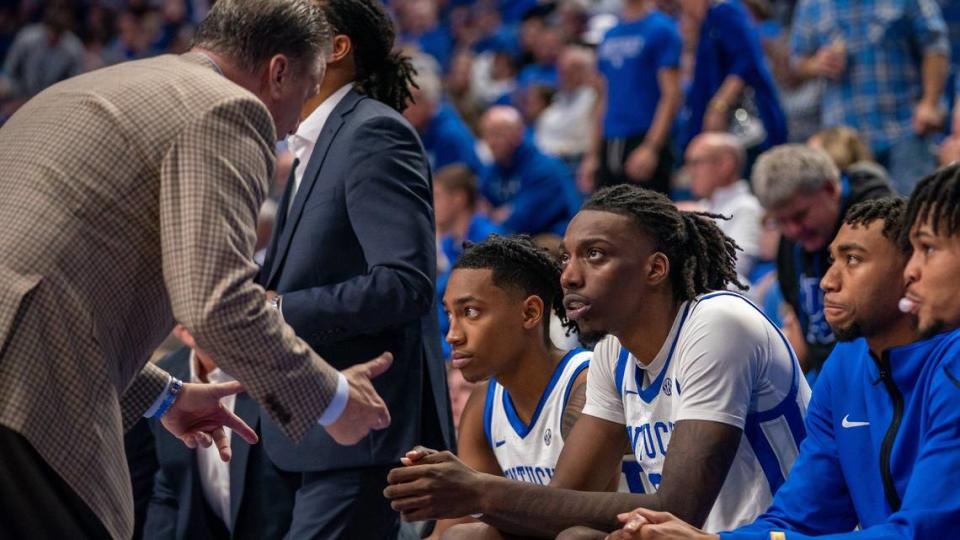 Kentucky head coach John Calipari speaks to freshman forward Aaron Bradshaw during the team’s loss to UNC Wilmington at Rupp Arena on Saturday.