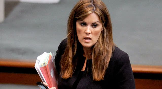 The book claims Abbott allegedly slapped his chief of staff, Peta Credlin, on the bum.