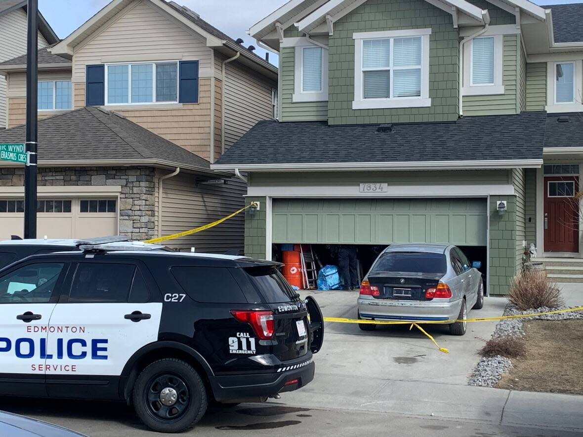 Police investigate a suspicious death in the Edgemont neighbourhood Wednesday.  (Nathan Gross/CBC - image credit)