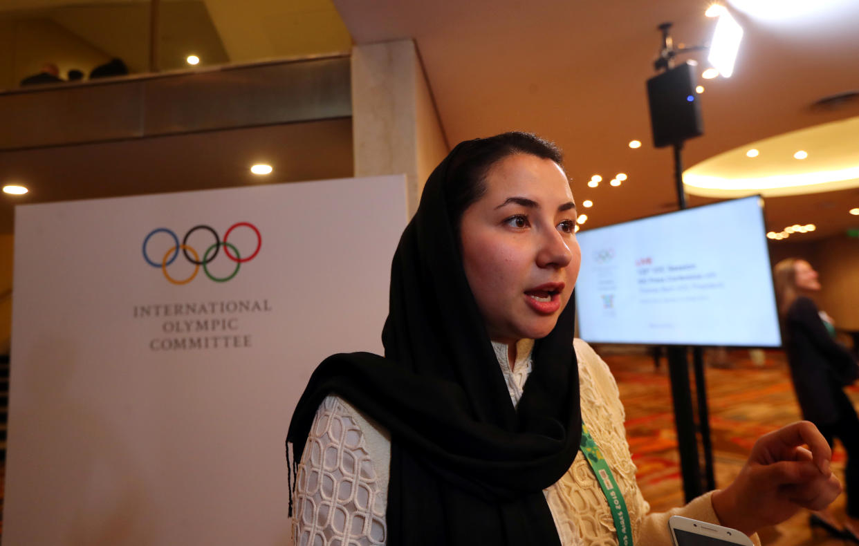 Samira Ashgari from Afghanistan, new member of the International Olympic Committee (IOC), talks to journalists at the end of the 133rd IOC session in Buenos Aires, Argentina October 9, 2018. REUTERS/Marcos Brindicci