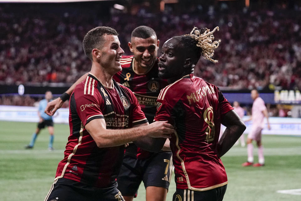 Atlanta United's Tristan Muyumba celebrates with Atlanta United defender Brooks Lennon (11) after scoring a goal during the first half of an MLS soccer match against Inter Miami on Saturday, Sept. 16, 2023, in Atlanta. (AP Photo/Brynn Anderson)