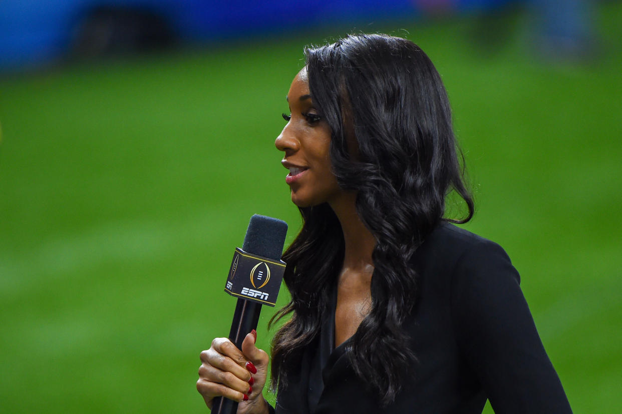 NEW ORLEANS, LA - JANUARY 01: ESPN analyst Maria Taylor reports from the sideline during the Allstate Sugar Bowl College Football Playoff Semifinal between the Ohio State Buckeyes and Clemson Tigers at the Mercedes-Benz Superdome on January 1, 2021 in New Orleans, LA. (Photo by Ken Murray/Icon Sportswire via Getty Images)