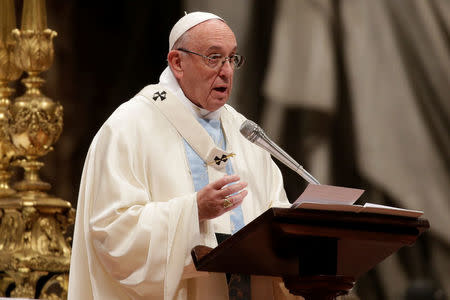 Pope Francis speaks as he leads a mass to mark the World Day of Peace in Saint Peter's Basilica at the Vatican January 1, 2018. REUTERS/Max Rossi