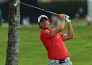 MIAMI, FL - MARCH 10: Rory McIlroy of Northern Ireland plays his second shot at the par 5, 1st hole during the third round of the World Golf Championship Cadillac Championship on the TPC Blue Monster Course at Doral Golf Resort And Spa on March 10, 2012 in Miami, Florida. (Photo by David Cannon/Getty Images)