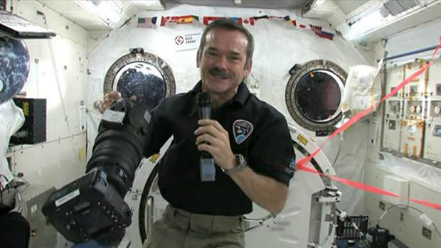 International Space Station Commander Chris Hadfield will have a live video chat with about 1,000 students from Bert Church High School in Airdrie, north of Calgary. 