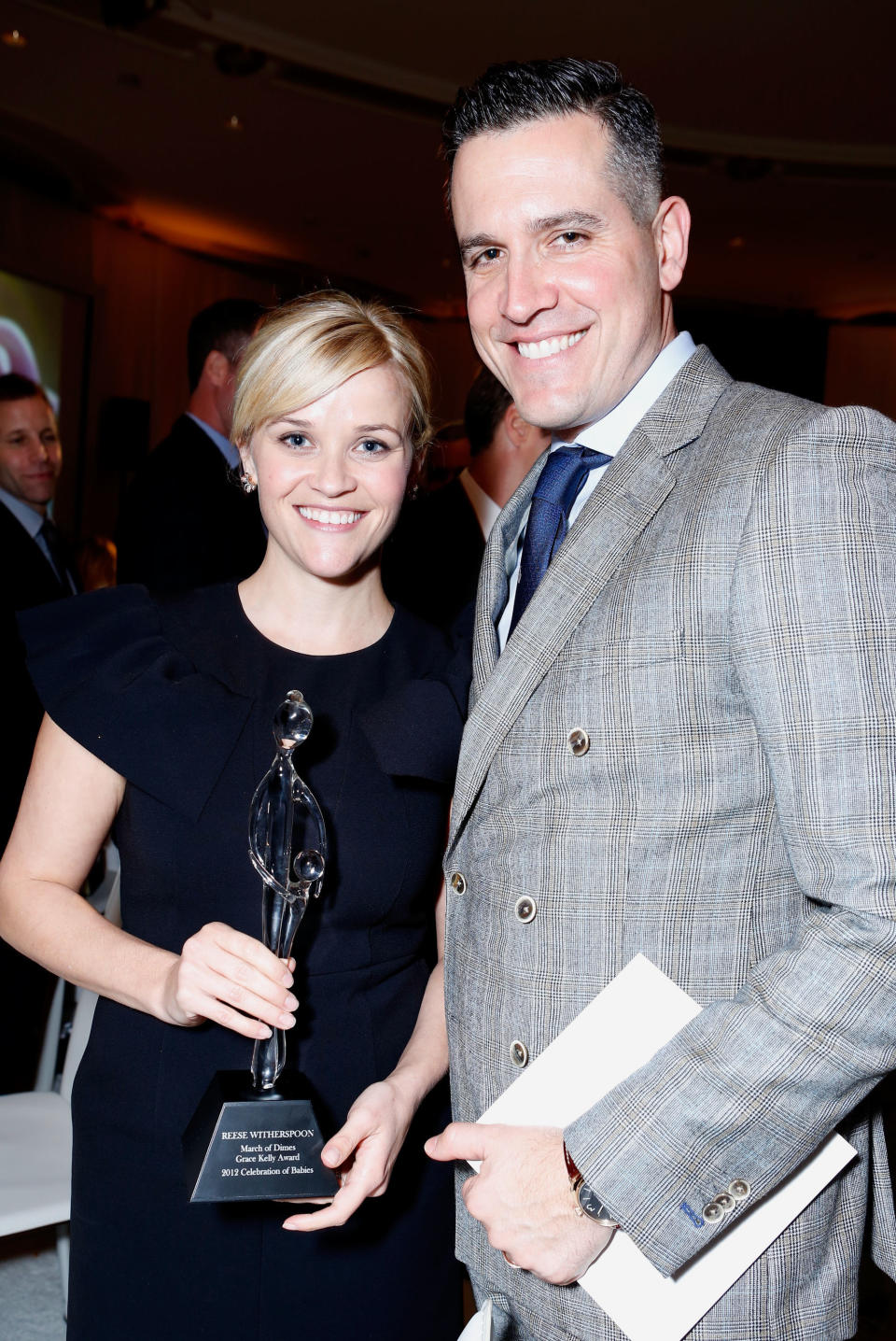 BEVERLY HILLS, CA - DECEMBER 07:  Honoree Reese Witherspoon and actor Jim Toth pose with the Grace Kelly Award during the 7th Annual March of Dimes Celebration of Babies, a Hollywood Luncheon, at the Beverly Hills Hotel on December 7, 2012 in Beverly Hills, California.  (Photo by Alexandra Wyman/Getty Images For March Of Dimes)