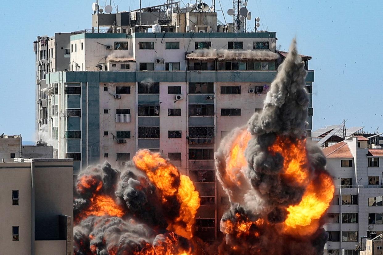 The moment an Israeli airstrike hit the al Jaala tower in Gaza City (AFP via Getty Images)