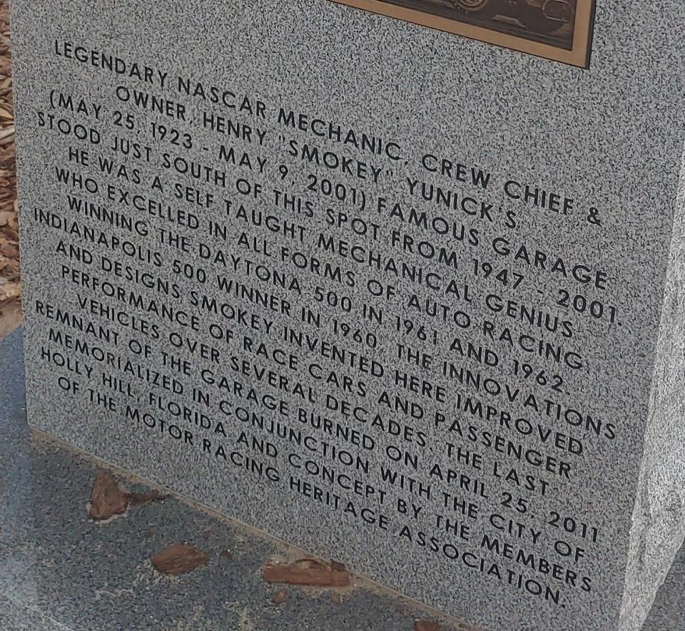 The wording on the Smokey Yunick monument near his old garage property in Daytona Beach.