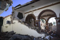 The Immaculate Concepcion Catholic church lies in ruins after an overnight earthquake in Guayanilla, Puerto Rico, Tuesday, Jan. 7, 2020. A 6.4-magnitude earthquake struck Puerto Rico before dawn on Tuesday, killing one man, injuring others and collapsing buildings in the southern part of the island. (AP Photo/Carlos Giusti)