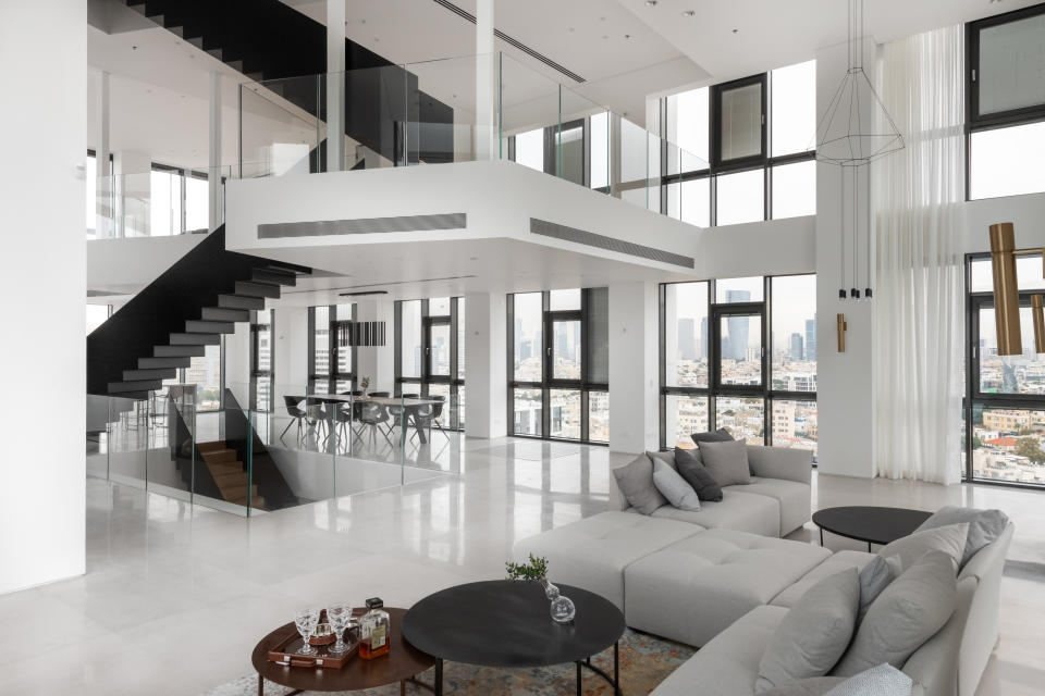 Central to the open plan space is a steel staircase. Photo: Beauchamp Estates