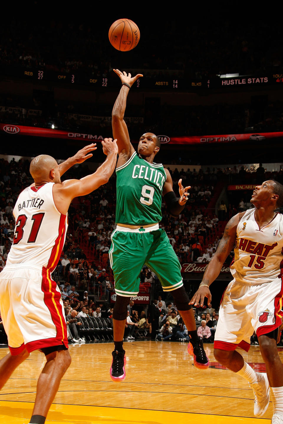 MIAMI, FL - OCTOBER 30: Rajon Rondo #9 of the Boston Celtics shoots against (L-R) Shane Battier #31 and Mario Chalmers #15 of the Miami Heat during the NBA game on October 30, 2012 at American Airlines Arena in Miami, Florida. NOTE TO USER: User expressly acknowledges and agrees that, by downloading and/or using this photograph, user is consenting to the terms and conditions of the Getty Images License Agreement. Mandatory copyright notice: Copyright NBAE 2012 (Photo by Issac Baldizon/NBAE via Getty Images)