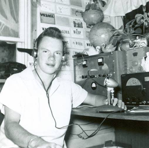 Jim Grant, age 18, on his back porch in Athens, Tennessee in 1954 with his homemade 75-watt transmitter, Heathkit VFO, and Hallicrafters S-77A receiver.