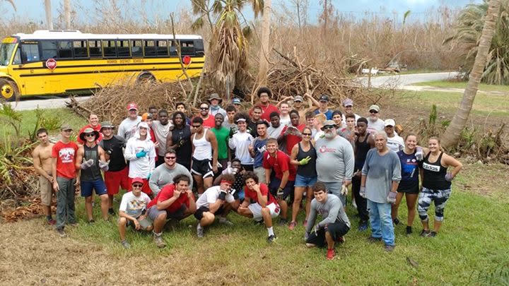 Members of the Key West football team helping the community clean up after Hurricane Irma. (Courtesy of Key West High School)