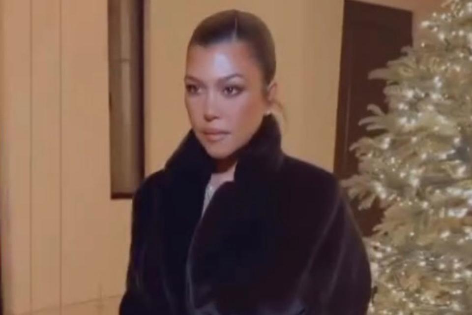 <p>Kourtney Kardashian/Instagram</p> Kourtney Kardashian Barker covered up this Christmas Eve.