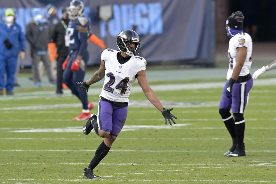 Baltimore Ravens cornerback Marcus Peters was reportedly fined by the NFL for his actions on the Tennessee Titans logo. (AP Photo/Mark Zaleski)