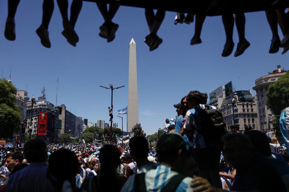 Fans of Argentina wait for the bus