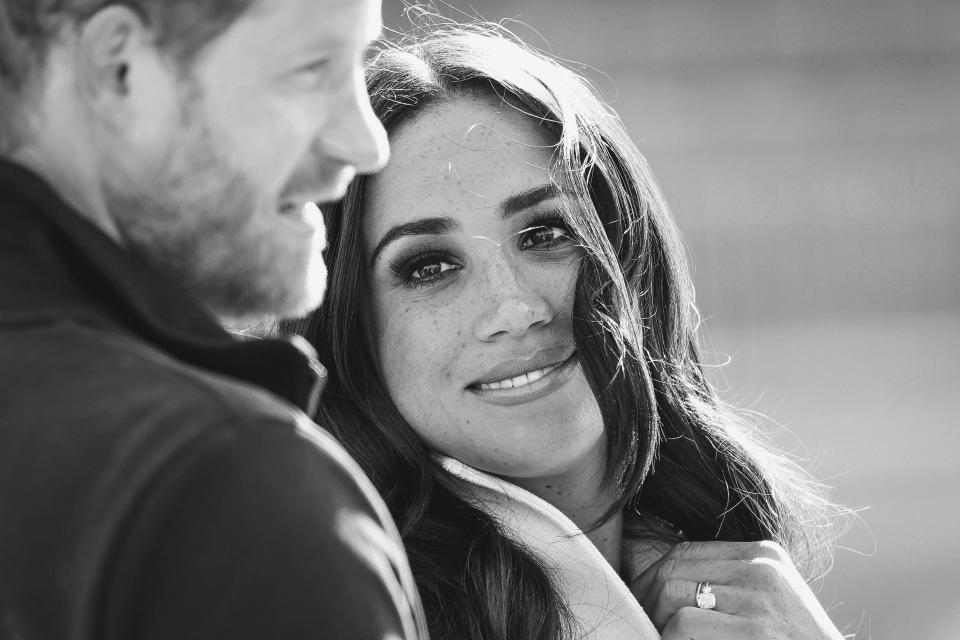 THE HAGUE, NETHERLANDS - APRIL 17:  (EDITORS NOTE: Image has been converted to black and white.) Prince Harry, Duke of Sussex and Meghan, Duchess of Sussex attend the Athletics Competition during day two of the Invictus Games The Hague 2020 at Zuiderpark on April 17, 2022 in The Hague, Netherlands. (Photo by Chris Jackson/Getty Images for the Invictus Games Foundation)
