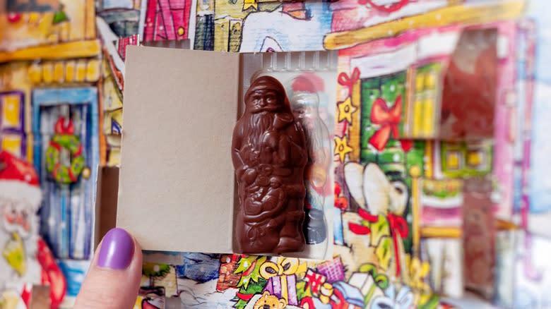 Person opening chocolate advent calendar