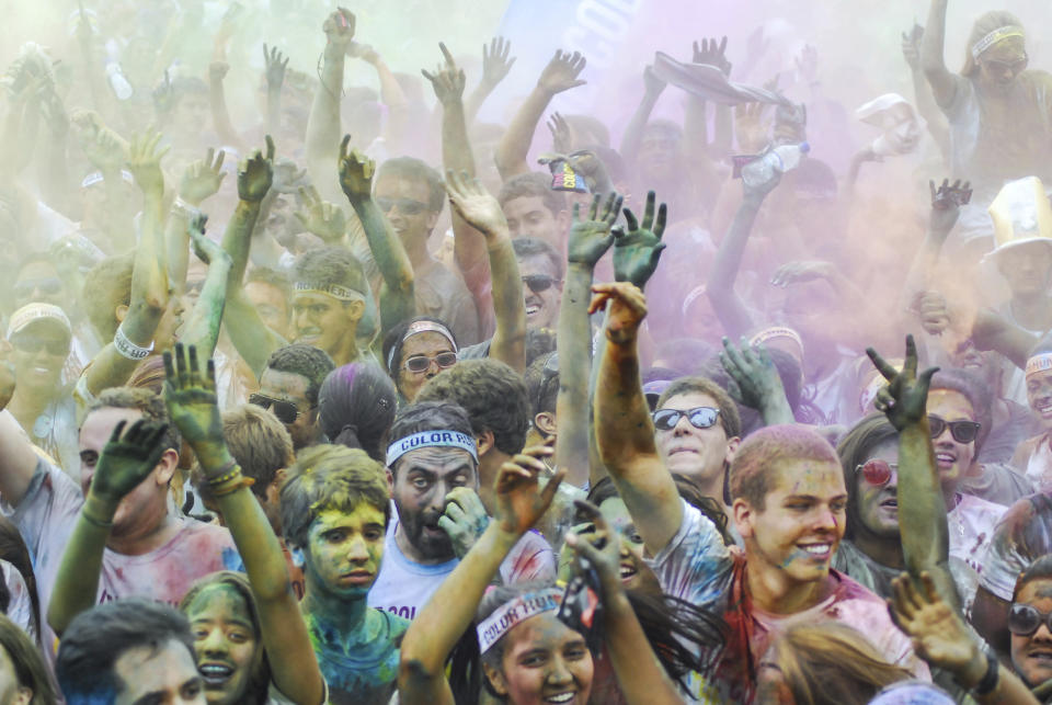 RIO DE JANEIRO, BRAZIL - DECEMBER 16: People celebrate during The Color Run on December 16, 2012 in Rio de Janeiro, Brazil. (Photo by Ronaldo Brandao/NewsFree/LatinContent/Getty Images)