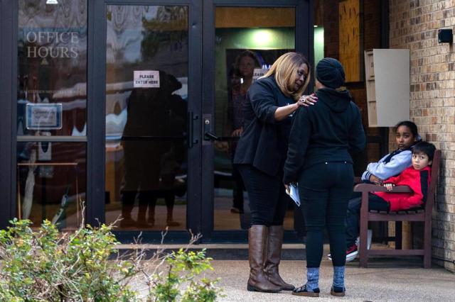 Melinda Hamilton, founder of Mothers of Murdered Angels, comforts Shaniqua Williams outside of a vigil for her cousin, Ja’Shawn James Poirier, at a church in Arlington on Tuesday, March 21, 2023. Poirier, 16, was shot by a classmate before school at Lamar High on Monday, authorities said.