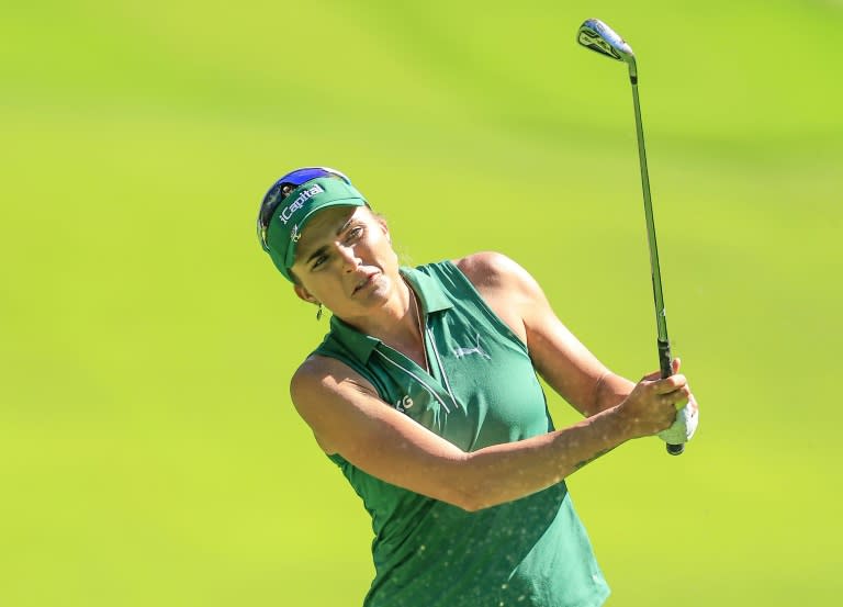American Lexi Thompson fired a four-under par 68 to grab a one-stroke lead after the first round of the Women's PGA Championship (DAVID CANNON)