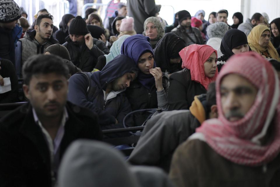 Hundred of Syrian families wait to register at the United Nations High Commissioner for Refugees (UNHCR) headquarters, in Beirut, Lebanon, Monday, Jan. 30, 2017. By executive order, U.S. President Donald Trump imposed a 90-day ban, Friday, that affects travel to the U.S. by citizens of Iraq, Syria, Iran, Sudan, Libya, Somalia and Yemen and puts an indefinite hold on a program resettling Syrian refugees. (AP Photo/Hassan Ammar)