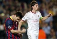 Barcelona's Lionel Messi celebrates after scroing a penalty against AC Milan during their Champions League soccer match at Nou Camp stadium in Barcelona Novenber 6, 2013. REUTERS/Albert Gea (SPAIN - Tags: SPORT SOCCER)