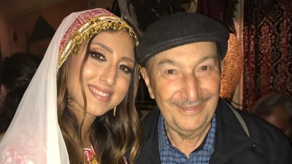 Mohammad Zarqa and his granddaughter Jenan Matari at her wedding henna in 2017. - Courtesy Shorouq Matari