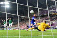 POZNAN, POLAND - JUNE 10: Nikica Jelavic of Croatia scores their second goal past Shay Given of Republic of Ireland during the UEFA EURO 2012 group C between Ireland and Croatia at The Municipal Stadium on June 10, 2012 in Poznan, Poland. (Photo by Jamie McDonald/Getty Images)