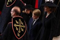 <p>In a decision it is understood their parents took time to consider, Prince George and Princess Charlotte walked behind the Queen’s coffin <a href="https://www.townandcountrymag.com/society/tradition/a41147500/queen-elizabeth-funeral-date-time/" rel="nofollow noopener" target="_blank" data-ylk="slk:as it was taken through Westminster Abbey during her funeral;elm:context_link;itc:0;sec:content-canvas" class="link ">as it was taken through Westminster Abbey during her funeral</a>. </p>