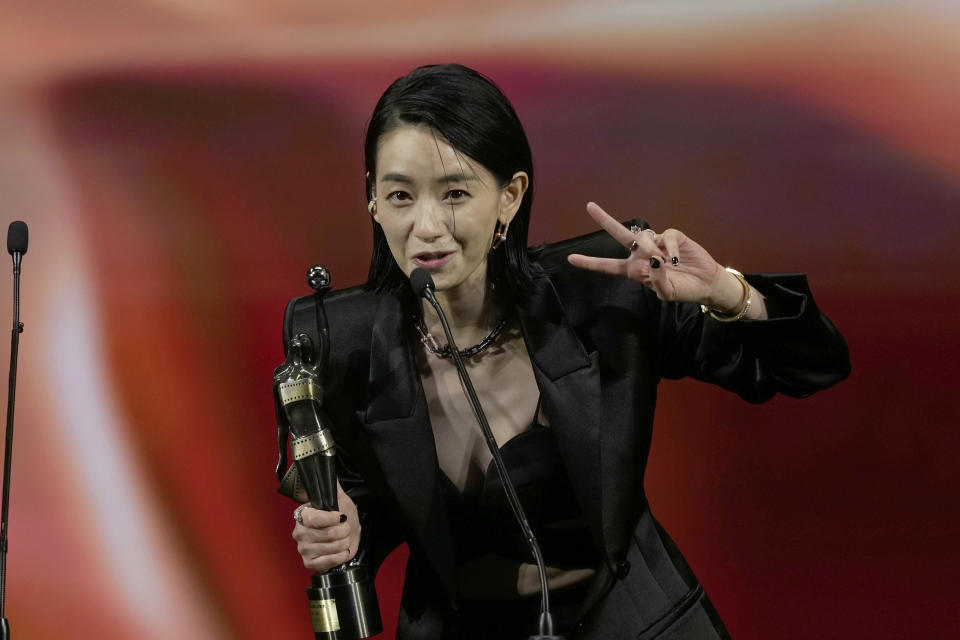 Chinese actress Cya Liu speaks after winning the Best Actress award for the movie "LIMBO" at the Hong Kong Film Awards, Sunday, July 17, 2022. (AP Photo/Kin Cheung)