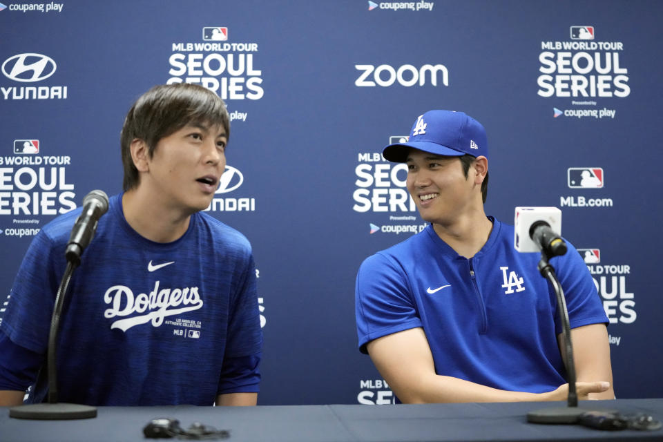 Los Angeles Dodgers' Shohei Ohtani, right, and his interpreter, Ippei Mizuhara, attend at a news conference ahead of a baseball workout at Gocheok Sky Dome in Seoul, South Korea, Saturday, March 16, 2024. Ohtani’s interpreter and close friend has been fired by the Dodgers following allegations of illegal gambling and theft from the Japanese baseball star. (AP Photo/Lee Jin-man)