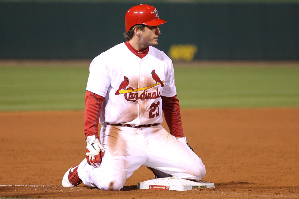 ST LOUIS, MO - OCTOBER 27: David Freese #23 of the St. Louis Cardinals rests at third base after hitting a game-tying two-run triple in the bottom of the ninth inning during Game Six of the MLB World Series against the Texas Rangers at Busch Stadium on October 27, 2011 in St Louis, Missouri. (Photo by Ezra Shaw/Getty Images)
