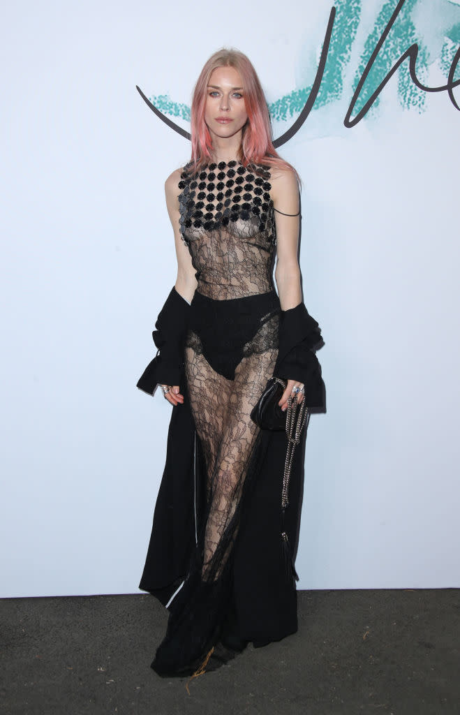 <p>Mary Charteris rocked up to the Serpentine Summer Party on June 28, 2017 in a lace dress finished with a chainmail-effect bodice.<br><br>She finished the look with peach-hued locks and a trench coat draped across her arms. <em>[Photo: Getty]</em> </p>