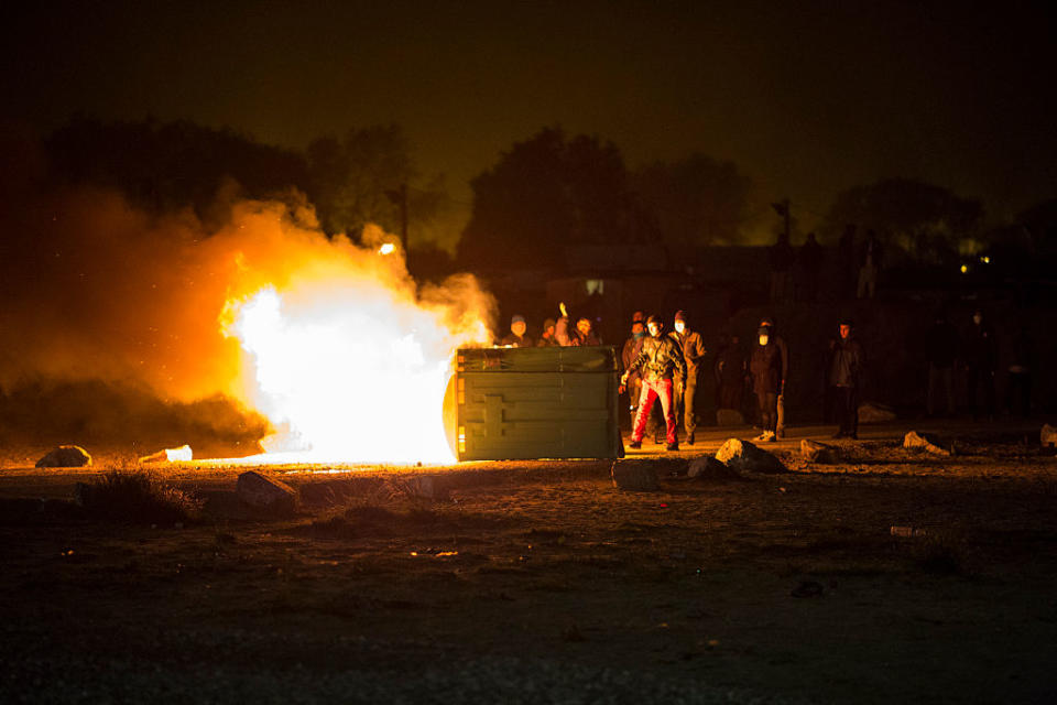 A fire burns at the Calais “Jungle” camp over the weekend.