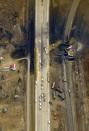 The site of a train derailment near the hamlet of Gainford, west of Edmonton, is seen in an aerial photo October 20, 2013. The Canadian National Railway train carrying petroleum crude oil and liquefied petroleum gas derailed west of Edmonton, Alberta, the Transportation Safety Board of Canada said on October 19. REUTERS/Dan Riedlhuber (CANADA - Tags: DISASTER TRANSPORT)