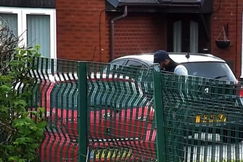 Asam Hussain next to the red Toyota Yaris