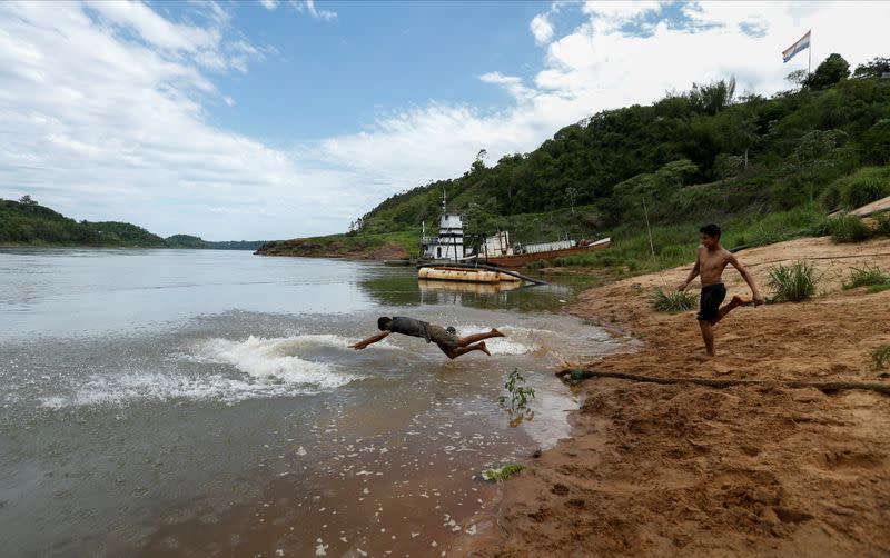 Rains hitting their lowest level in decades sap the water source for the mighty Parana River