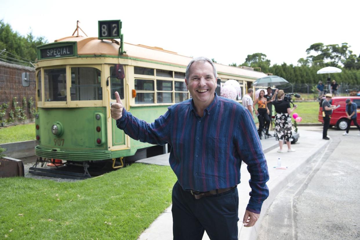 karl kennedy with the vintage tram in neighbours
