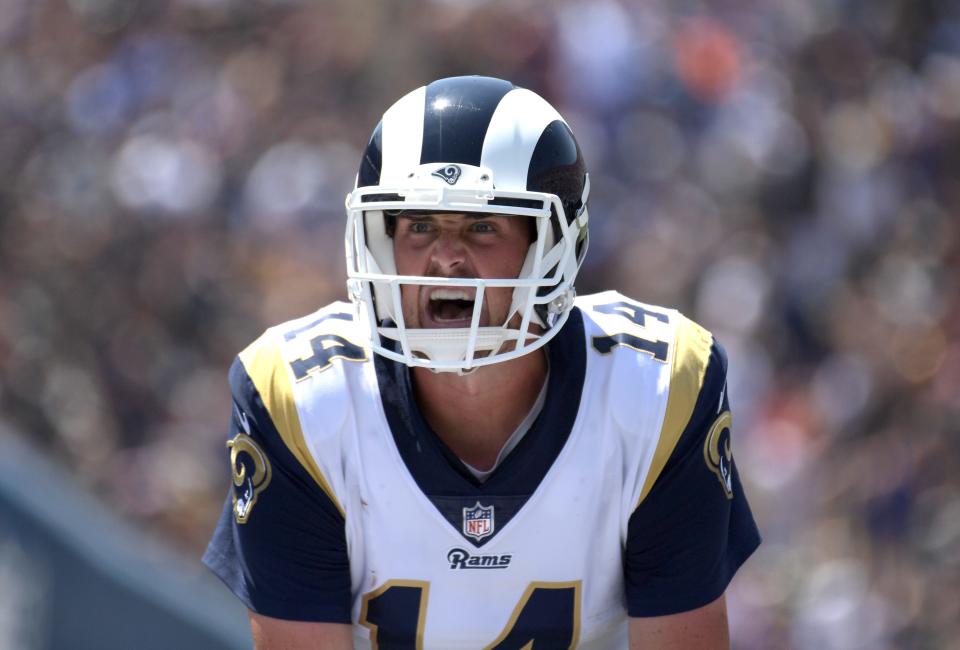 Los Angeles Rams quarterback Sean Mannion prepares to take the snap against the Oakland Raiders during a 2018 preseason game.