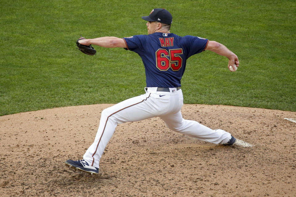 FILE - In this Sept. 4, 2020, file photo, Minnesota Twins relief pitcher Trevor May throws to a Detroit Tigers batter during the second game of a baseball doubleheader in Minneapolis. The New York Mets reached their first agreement with a free agent since Steven Cohen bought the team, a deal with 31-year-old May, a person familiar with the negotiations tells The Associated Press. The person spoke on condition of anonymity Tuesday, Dec. 1, because the agreement is subject to a successful physical. (AP Photo/Bruce Kluckhohn, File)