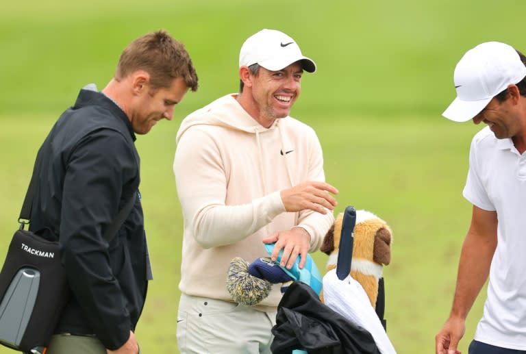 Four-time major winner Rory McIlroy of Northern Ireland shares a smile on the driving range during practice for the 106th PGA Championship (Michael Reaves)