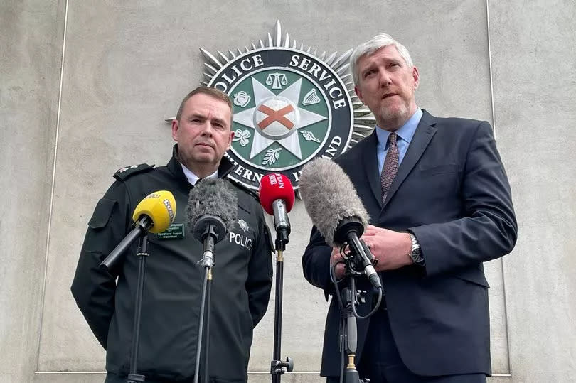 Chief Superintendent Sam Donaldson and Stormont Infrastructure Minister John O'Dowd -Credit:Rebecca Black/PA Wire