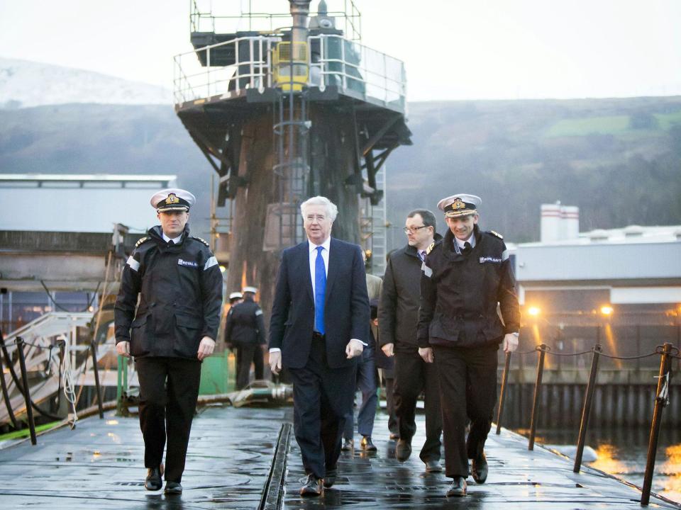 Sir Michael Fallon on board the HMS Vigilant in Clyde. The submarine is one of four vessels carrying the Trident nuclear system: Getty