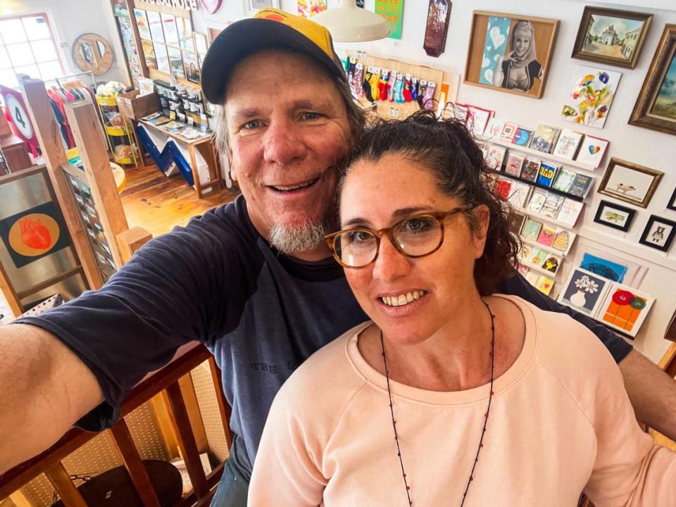 Alan and Shari Fraser, owners of The Love Story Project store in Cambria, pose for a selfie. They have relocated their Cambria shop to a larger space a half block away from the original location.