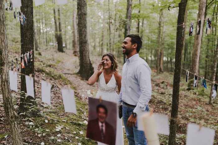 <p>This couple became engaged in a Tennessee forest, surrounded by dozens of sweet photos of their relationship that the to-be groom had hung around trees. </p><p><em>Via <a rel="nofollow noopener" href="https://howheasked.com/gracey-hope-and-jacob/" target="_blank" data-ylk="slk:How He Asked;elm:context_link;itc:0;sec:content-canvas" class="link ">How He Asked</a></em><br></p>