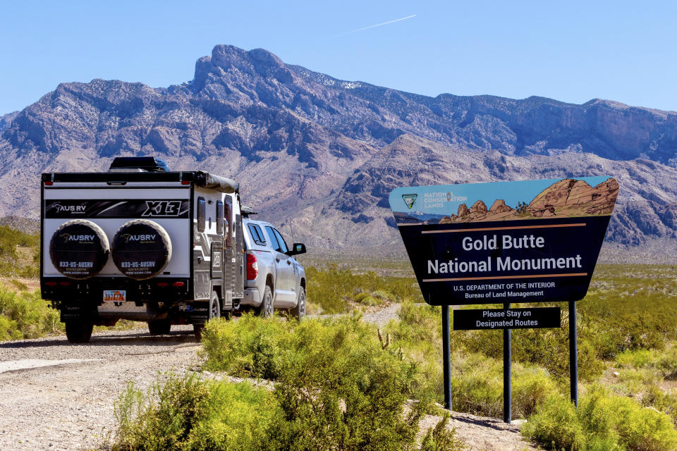 A motorist enters the Gold Butte National Monument near the Bundy ranch, Tuesday, April 9, 2024, in Bunkerville, NV. Ten years have passed since hundreds of protesters including armed riflemen answered a family call for help which forced U.S. agents and contract cowboys to abandon an effort to round up family cattle in a dispute over grazing permits and fees. Despite federal prosecutions, no family members were convicted of a crime. (AP Photo/Ty ONeil)